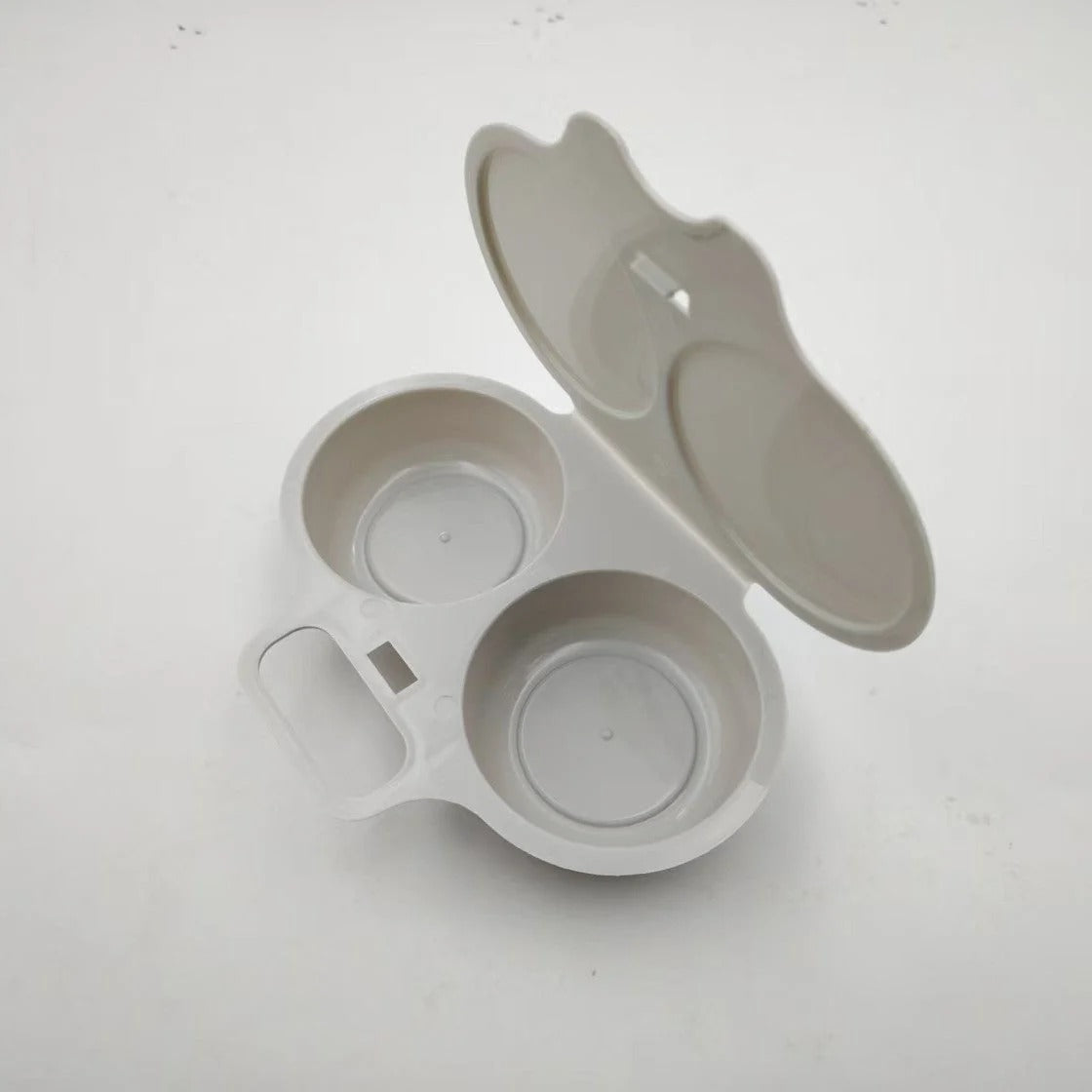 Magnetron eierkoker met deksel en handvat